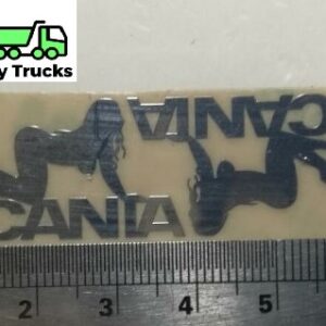 Scania pigen ligger på Scania tekst